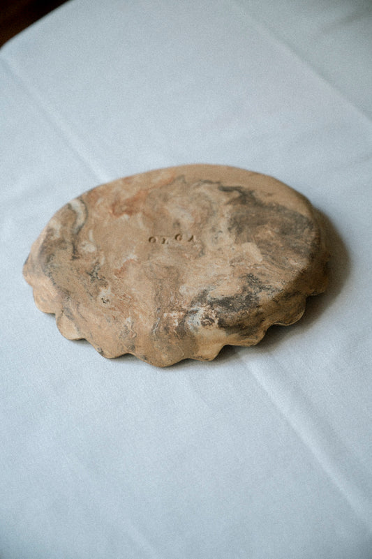 Wave plate M in marble